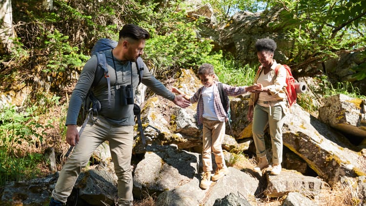 a family hiking and demonstrating rv leave no trace rules for kids